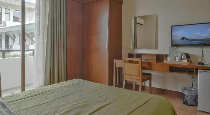 Bed in Mansion Garden Hotel