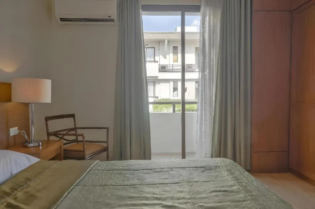 Bed in Mansion Garden Hotel