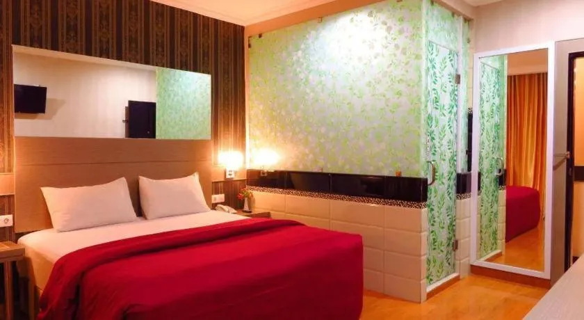 Bed in Hotel Menara Lexus