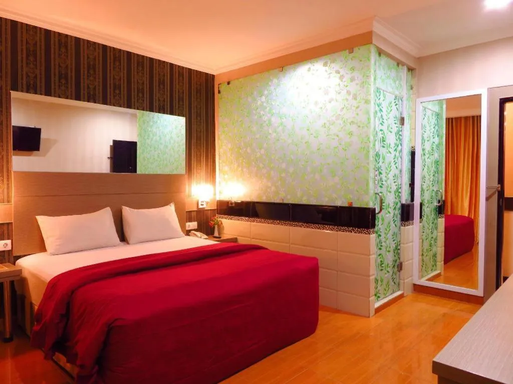 Bed in Hotel Menara Lexus