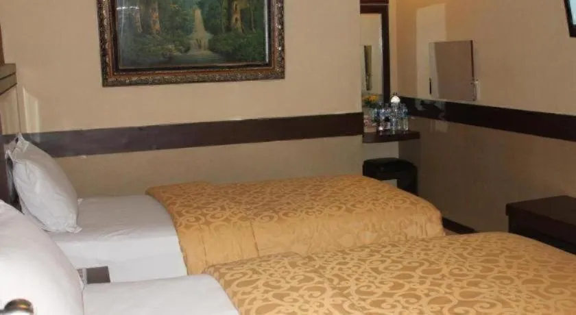 Bed in Hotel Menara Lexus