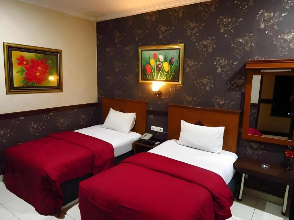 Bed in Hotel Menara Lexus