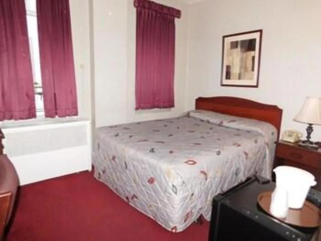 Bed in Hotel Harrington