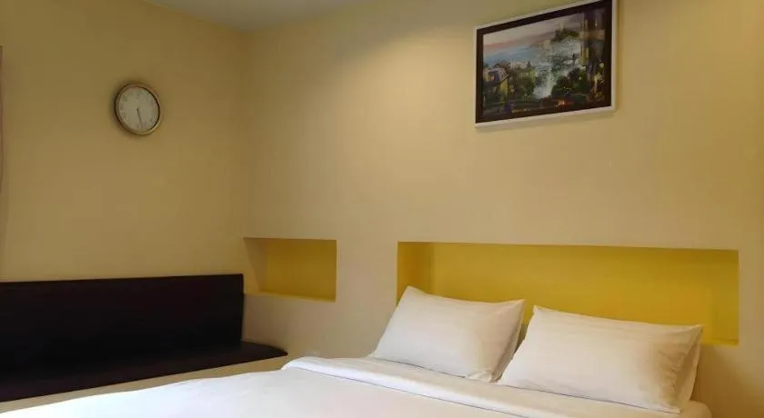 Bed in C2 Residence Hotel