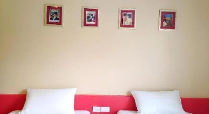 Bed in C2 Residence Hotel