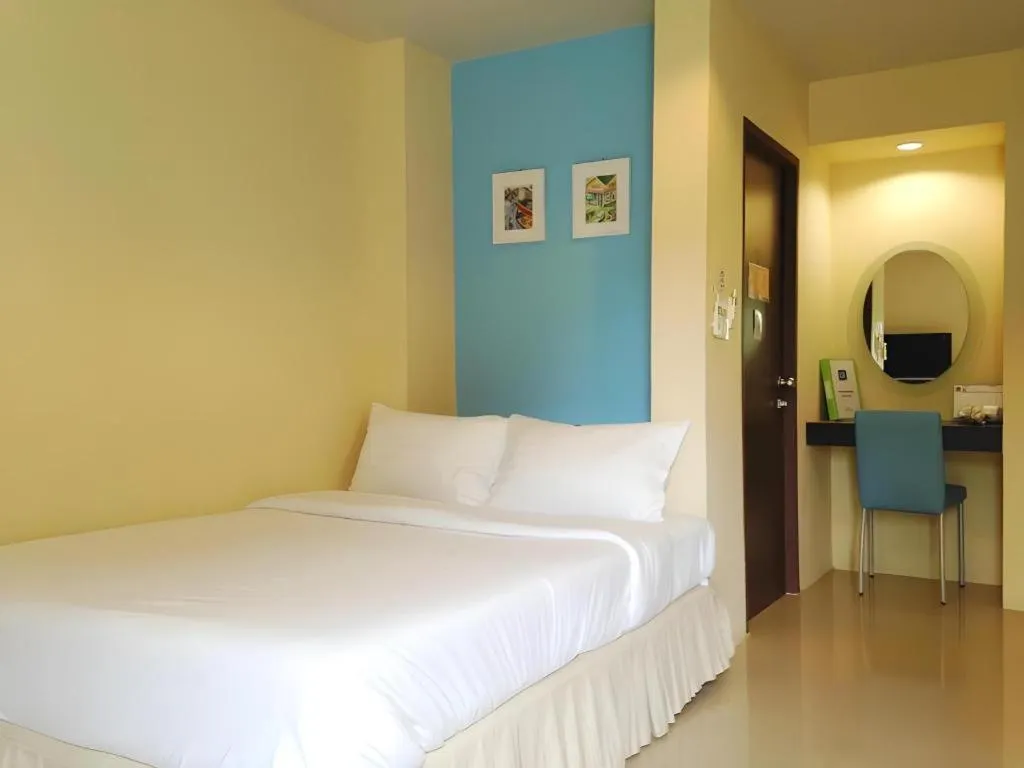 Bed in C2 Residence Hotel