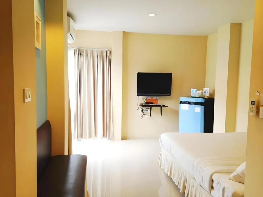 Bed in C2 Residence Hotel