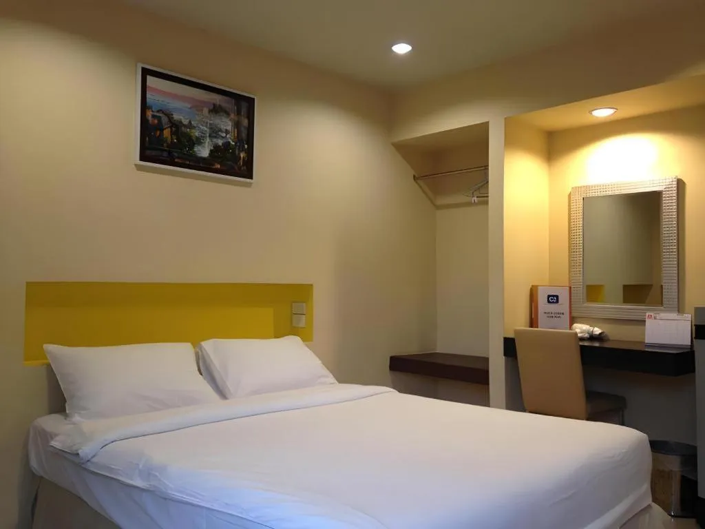 Bed in C2 Residence Hotel