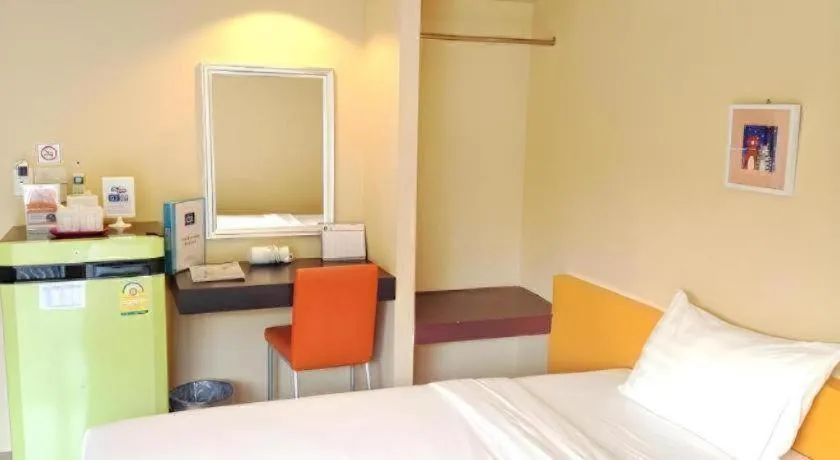 Bed in C2 Residence Hotel
