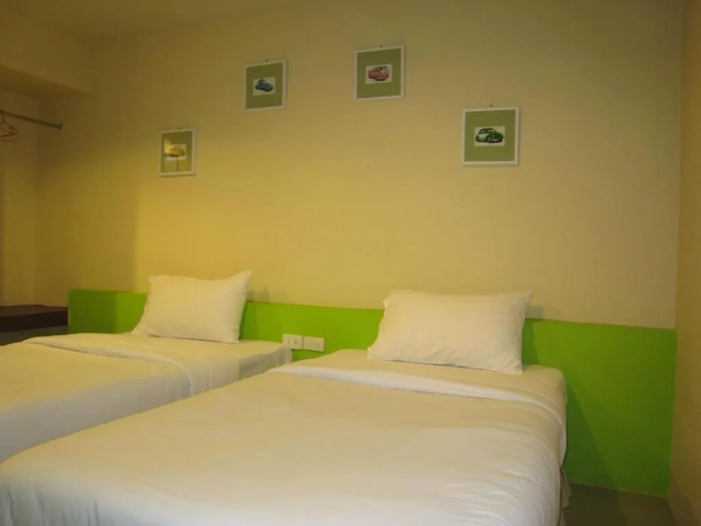 Bed in C2 Residence Hotel