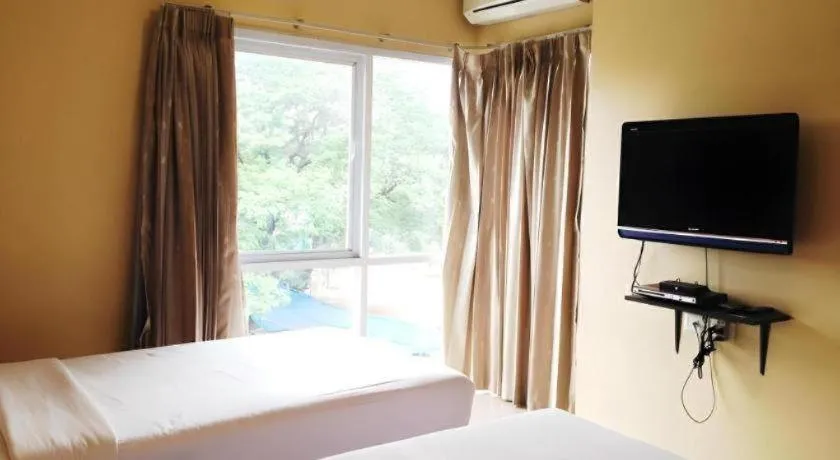 Bed in C2 Residence Hotel