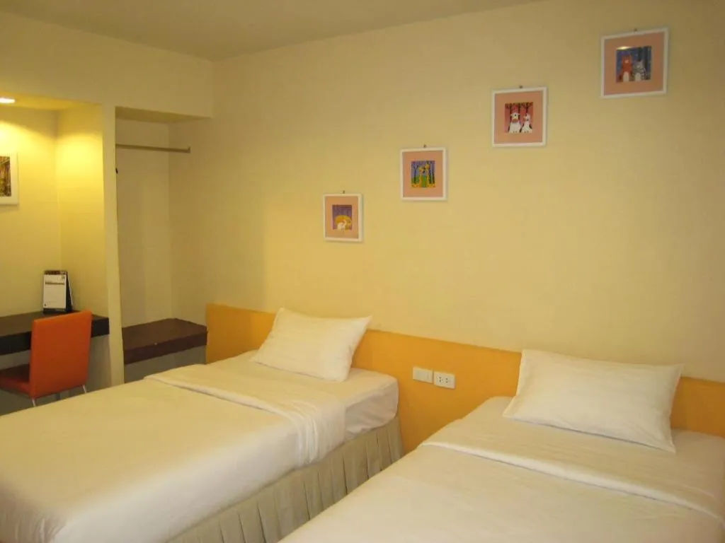 Bed in C2 Residence Hotel