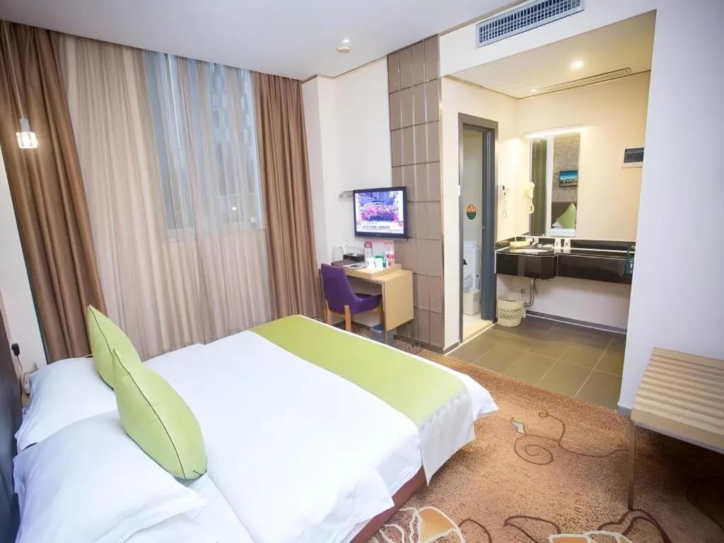 Bed in GreenTree Alliance Shenzhen Shekou Sea World Taizi Road Hotel