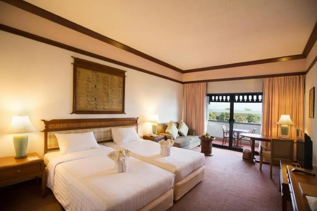 Bed in Imperial Golden Triangle Resort