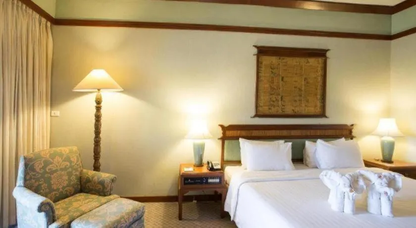 Bed in Imperial Golden Triangle Resort