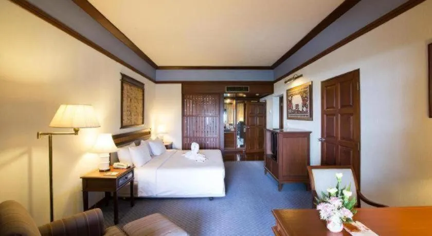 Bed in Imperial Golden Triangle Resort