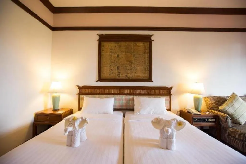 Bed in Imperial Golden Triangle Resort