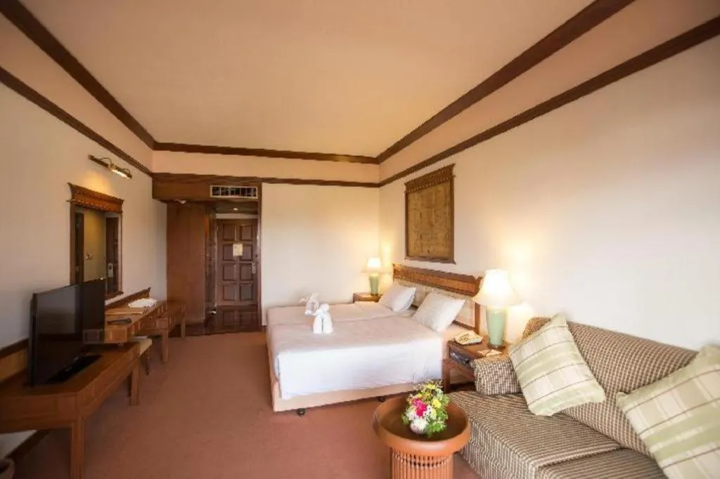 Bed in Imperial Golden Triangle Resort