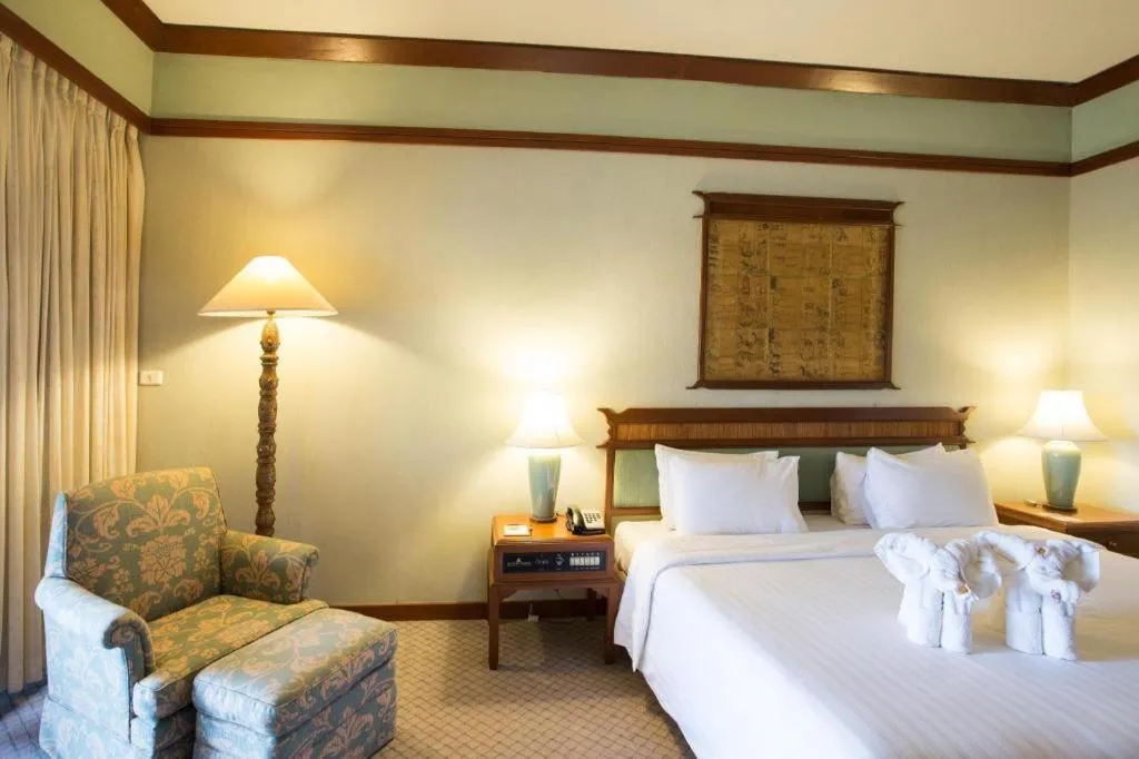 Bed in Imperial Golden Triangle Resort