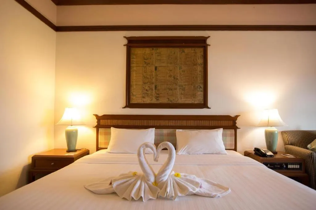 Bed in Imperial Golden Triangle Resort