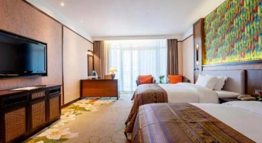 Bed in Riyuegu Hotsprings Resort