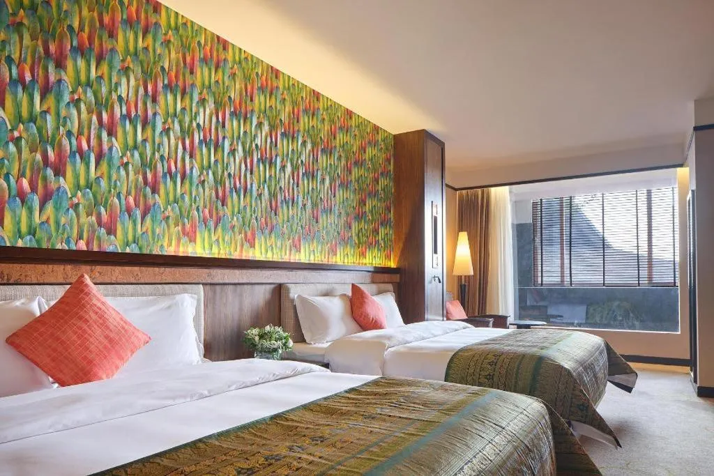 Bed in Riyuegu Hotsprings Resort