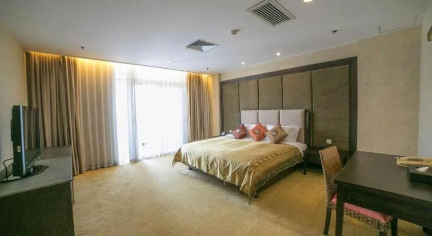 Bed in Riyuegu Hotsprings Resort