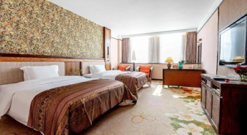 Bed in Riyuegu Hotsprings Resort