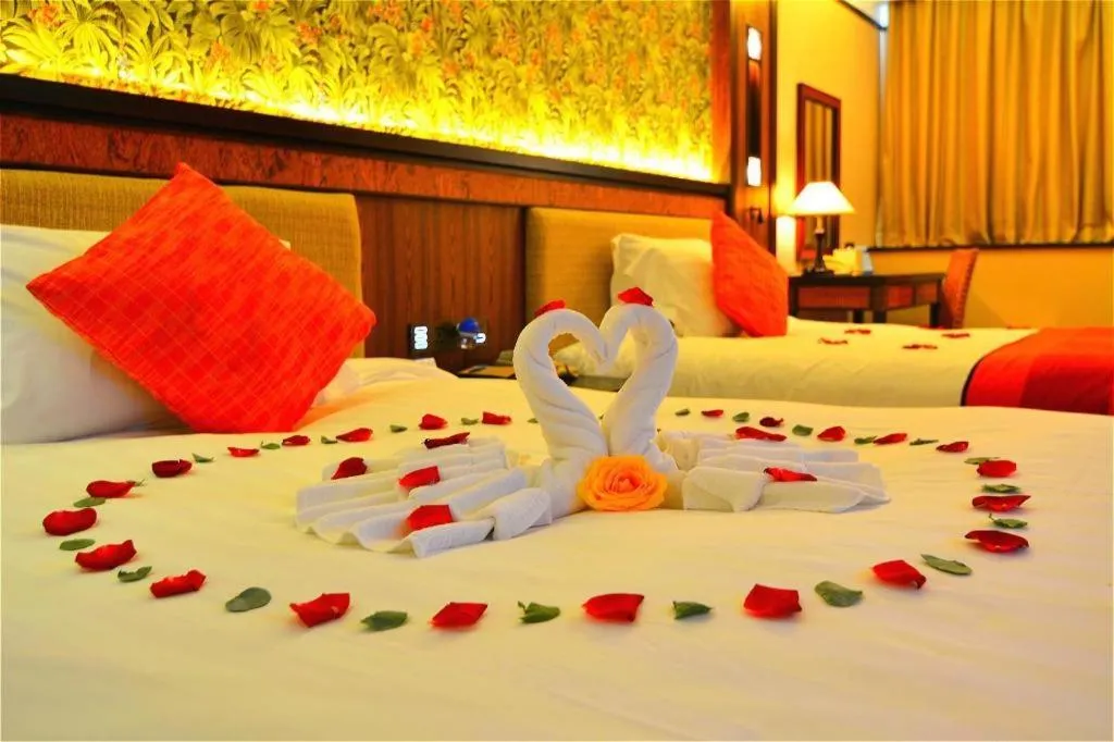 Bed in Riyuegu Hotsprings Resort