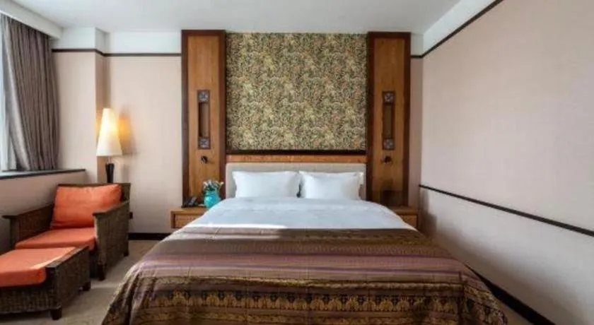 Bed in Riyuegu Hotsprings Resort