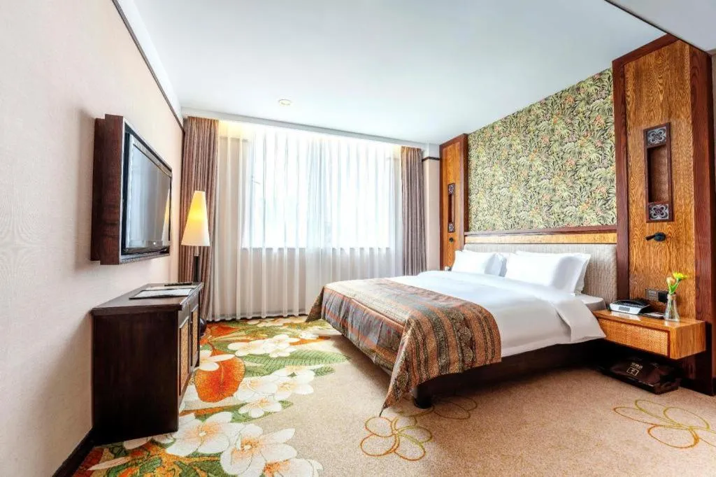 Bed in Riyuegu Hotsprings Resort