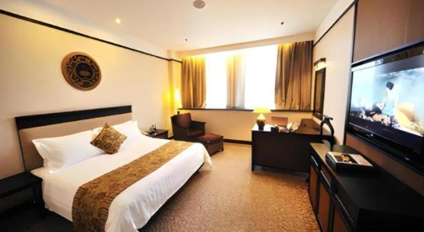 Bed in Riyuegu Hotsprings Resort