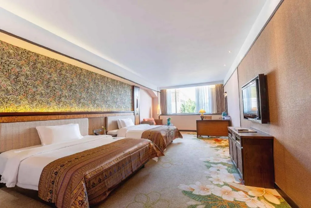 Bed in Riyuegu Hotsprings Resort