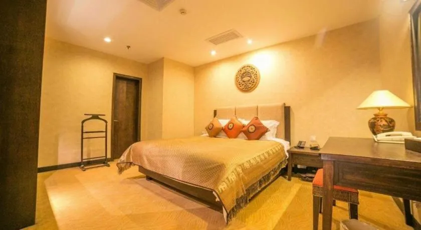 Bed in Riyuegu Hotsprings Resort