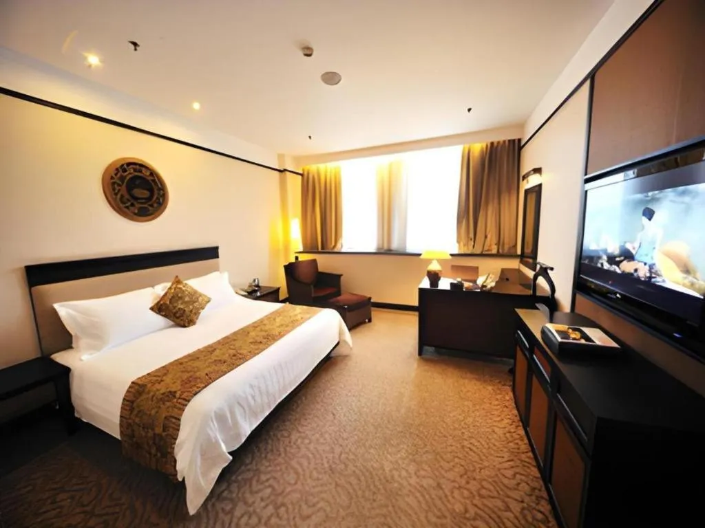 Bed in Riyuegu Hotsprings Resort