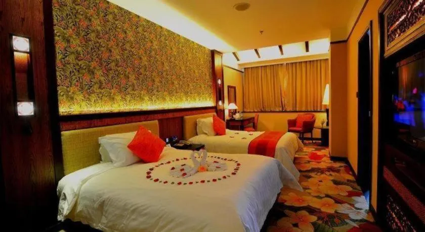 Bed in Riyuegu Hotsprings Resort