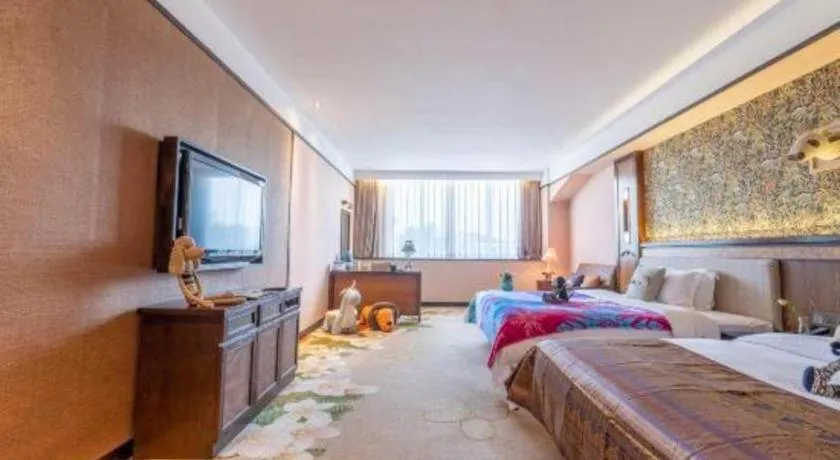 Bed in Riyuegu Hotsprings Resort