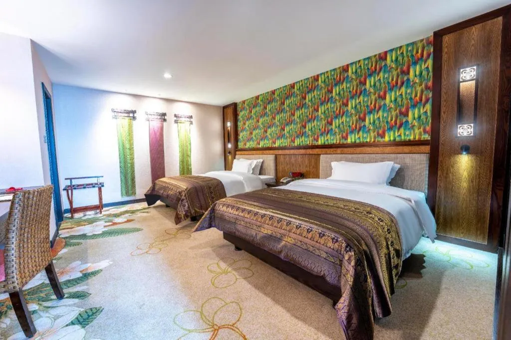 Bed in Riyuegu Hotsprings Resort