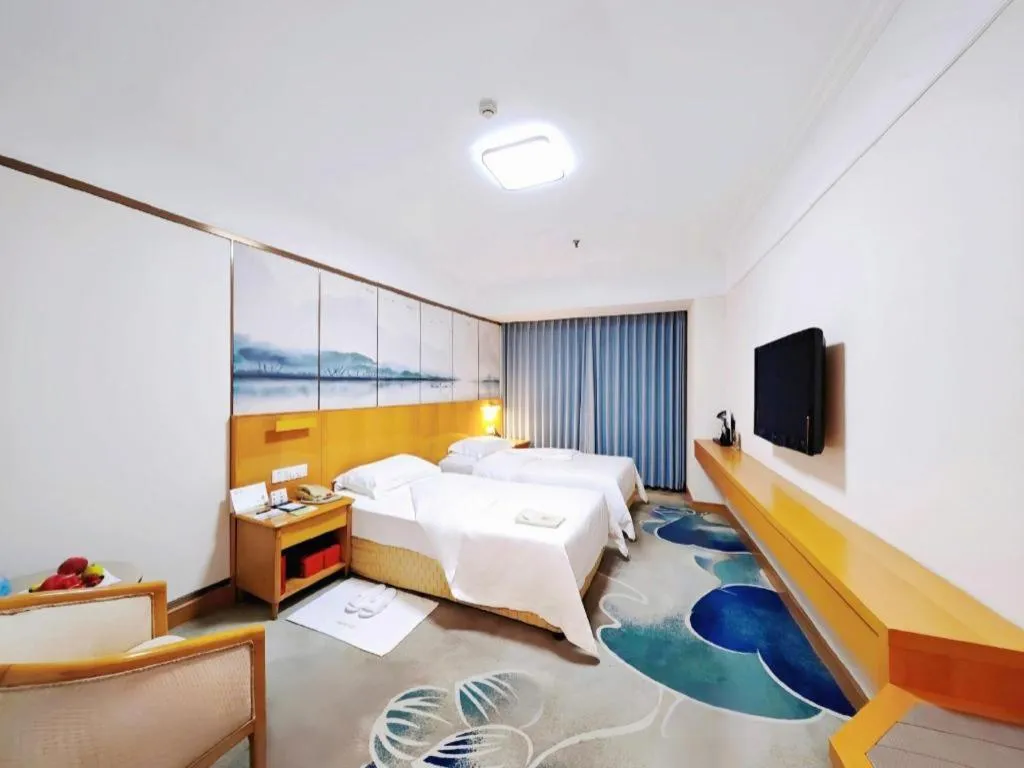 Bed in Xiamen Jingmin Central Hotel