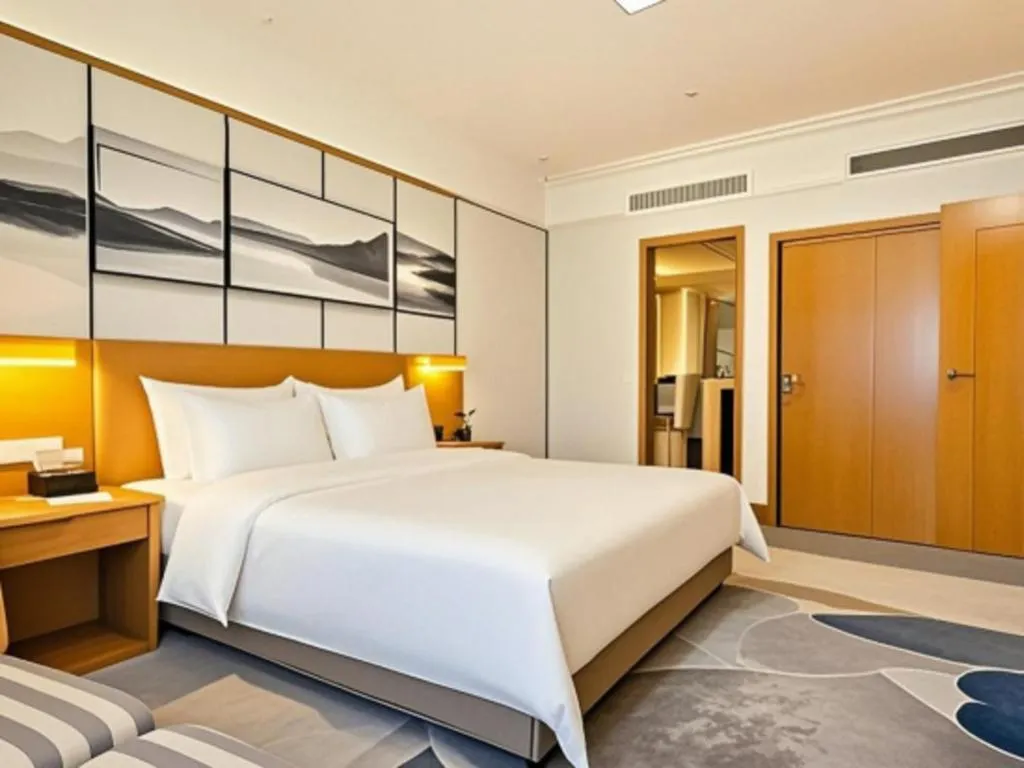 Bed in Xiamen Jingmin Central Hotel