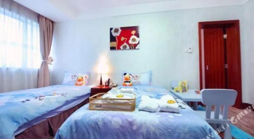 Bed in Xiamen Jingmin Central Hotel