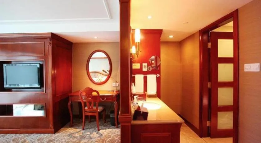 Bed in Xiamen Jingmin Central Hotel