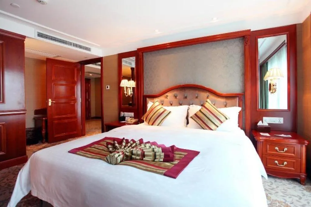 Bed in Xiamen Jingmin Central Hotel