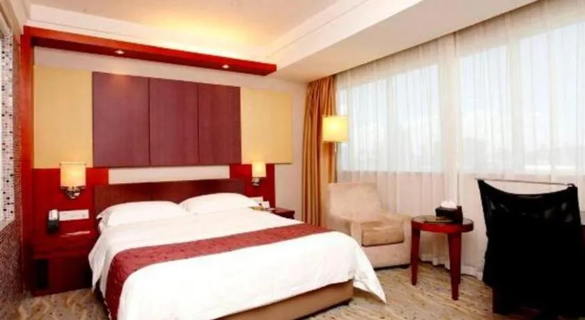 Bed in Xiamen Jingmin Central Hotel