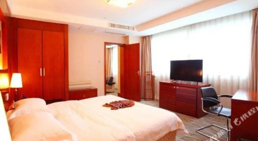 Bed in Xiamen Jingmin Central Hotel