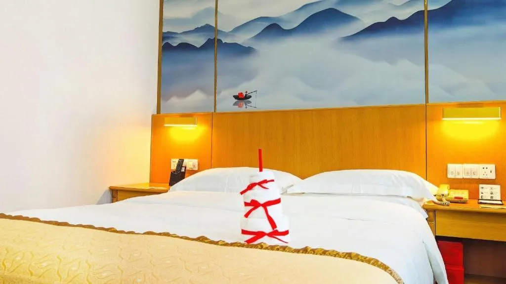 Bed in Xiamen Jingmin Central Hotel