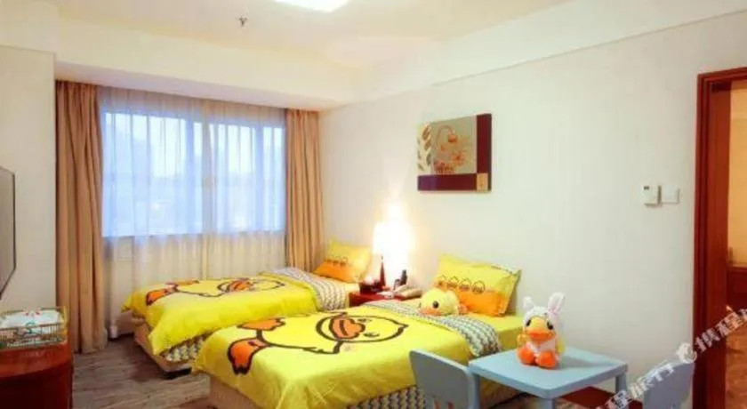 Bed in Xiamen Jingmin Central Hotel