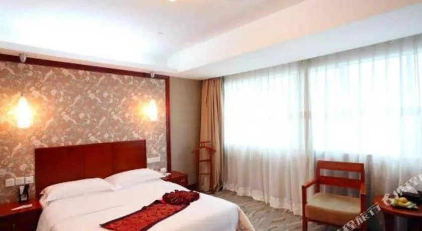 Bed in Xiamen Jingmin Central Hotel