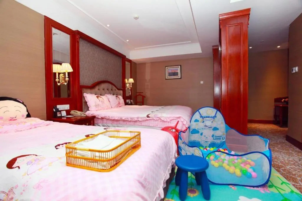 Bed in Xiamen Jingmin Central Hotel