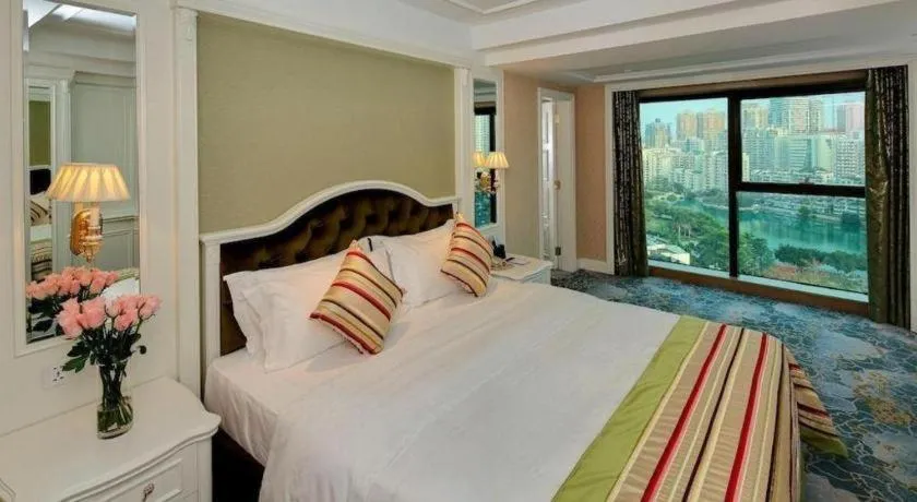 Bed in Xiamen Jingmin Central Hotel